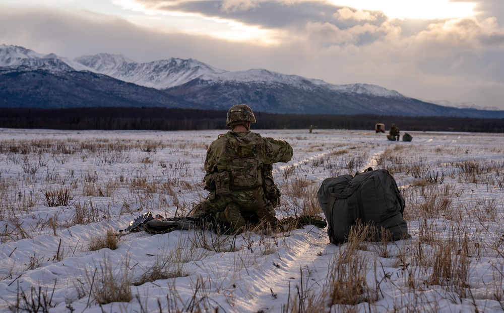 2nd Infantry Brigade, 11th Airborne Division Soldiers conducted a winter jump into Malamute DZ