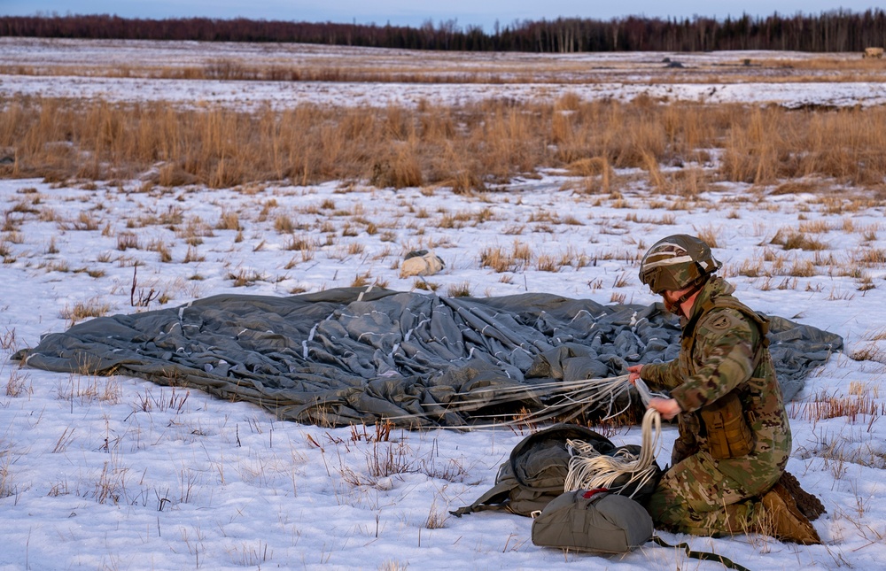 2nd Infantry Brigade, 11th Airborne Division Soldiers conducted a winter jump into Malamute DZ