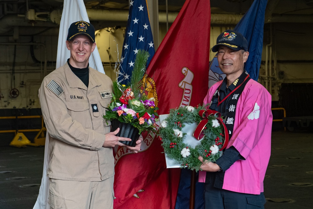 USS America, JS Ise Host Gift Exchange