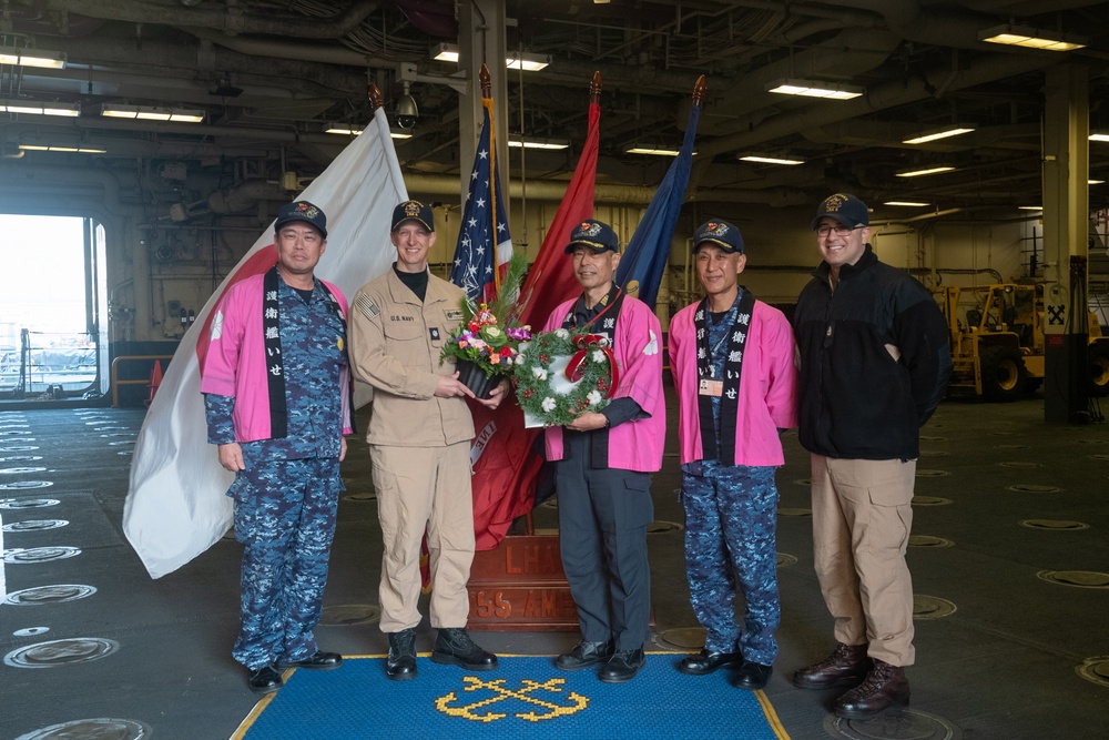 USS America, JS Ise Host Gift Exchange