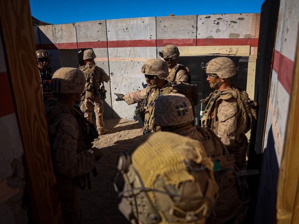 U.S. Marines with 2nd Battalion, 23rd Marine Regiment, conduct platoon supported raids during training for upcoming deployment