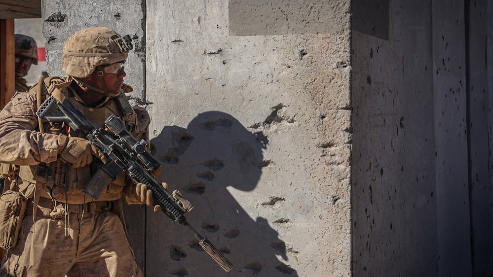 U.S. Marines with 2nd Battalion, 23rd Marine Regiment, conduct platoon supported raids during training for upcoming deployment