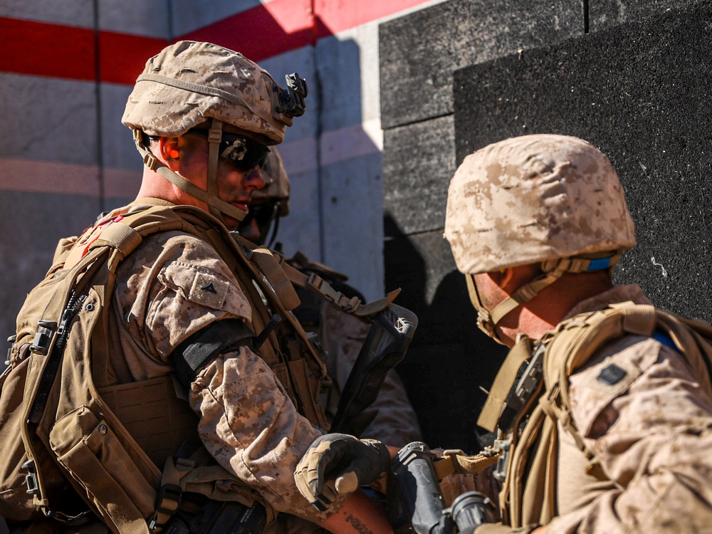 U.S. Marines with 2nd Battalion, 23rd Marine Regiment, conduct platoon supported raids during training for upcoming deployment