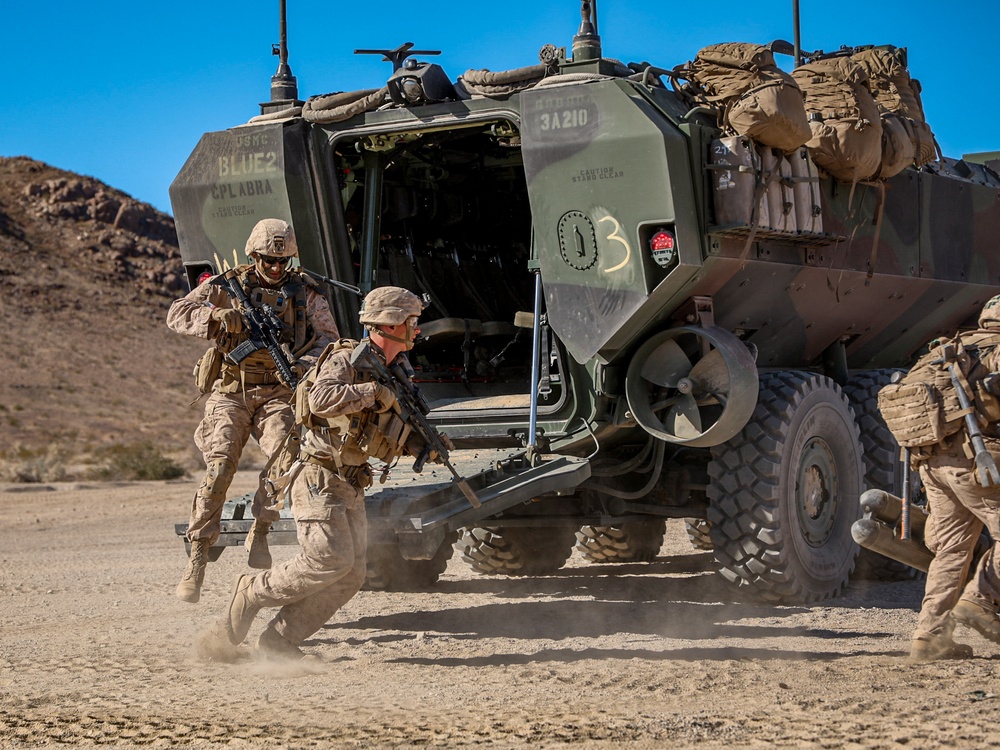 U.S. Marines with 2nd Battalion, 23rd Marine Regiment, conduct platoon supported raids during training for upcoming deployment