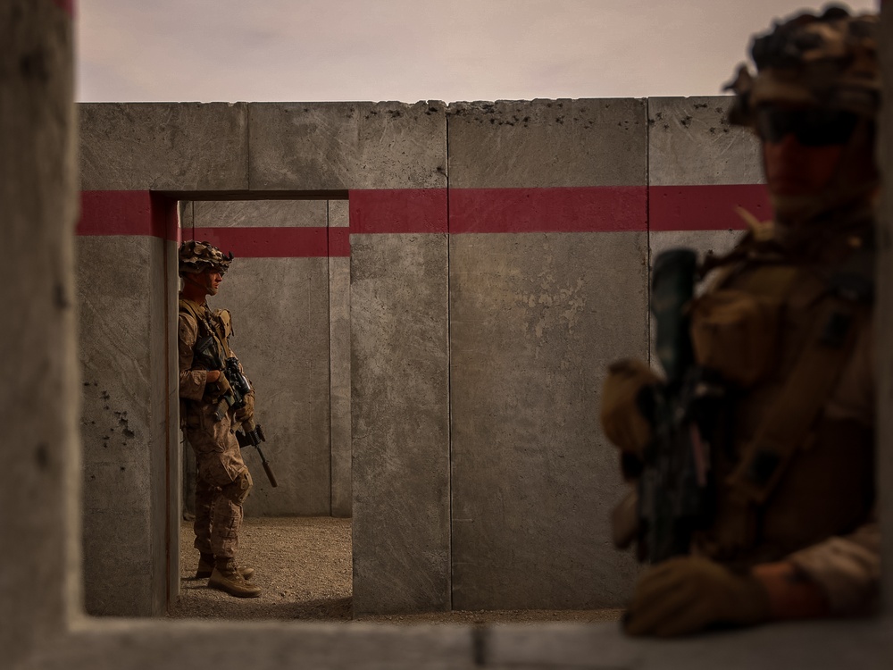 U.S. Marines with Fox Company, 2nd Battalion, 23rd Marine Regiment, conduct a company supported urban attack during training for upcoming deployment 