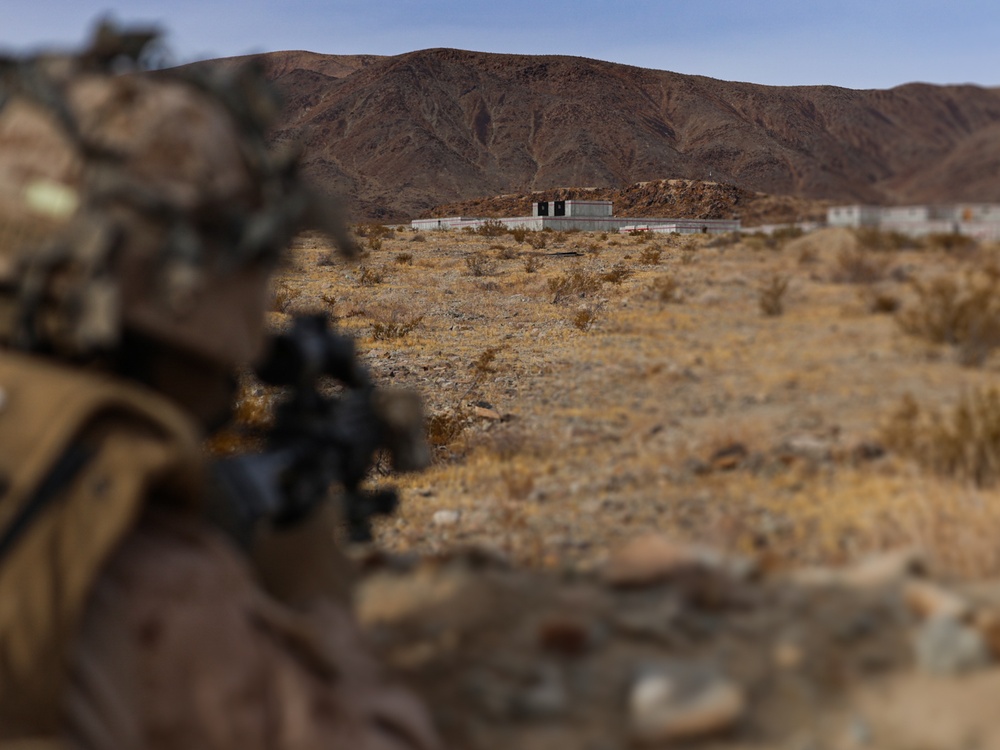 U.S. Marines with Fox Company, 2nd Battalion, 23rd Marine Regiment, conduct a company supported urban attack during training for upcoming deployment 