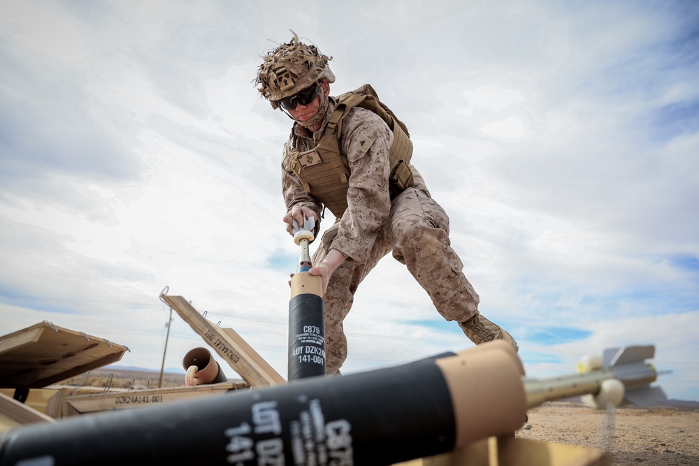 U.S. Marines with 2nd Battalion, 23rd Marine Regiment, fire mortars during training for upcoming deployment