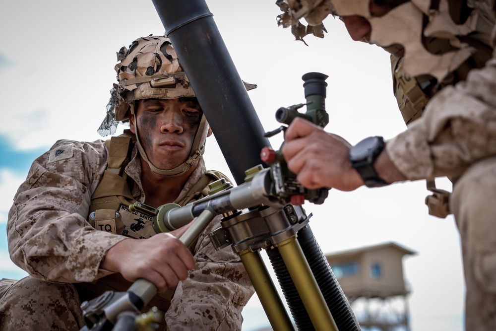 U.S. Marines with 2nd Battalion, 23rd Marine Regiment, fire mortars during training for upcoming deployment