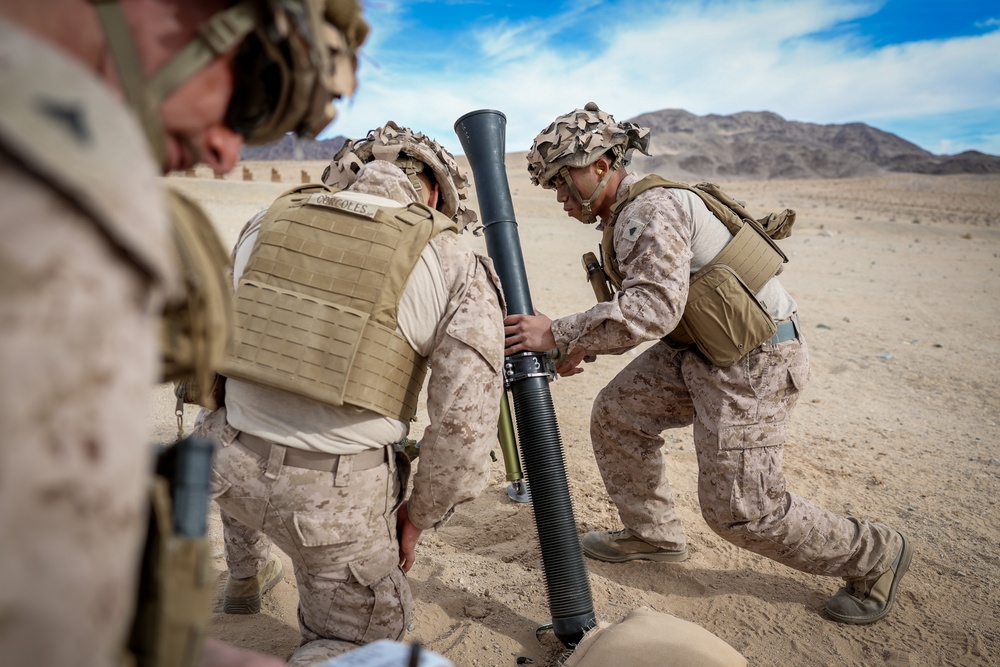 U.S. Marines with 2nd Battalion, 23rd Marine Regiment, fire mortars during training for upcoming deployment