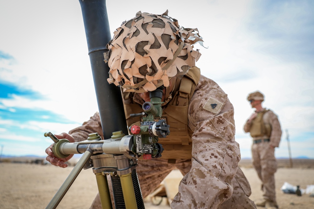 U.S. Marines with 2nd Battalion, 23rd Marine Regiment, fire mortars during training for upcoming deployment