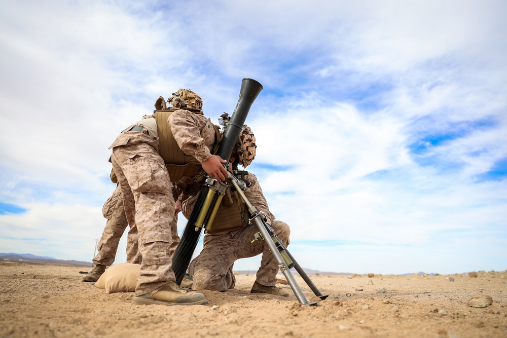 U.S. Marines with 2nd Battalion, 23rd Marine Regiment, fire mortars during training for upcoming deployment