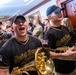 Members of the U.S. Military Academy at West Point Spirit Band stop by the office of the Honorable Christine Wormuth, Secretary of the Army, during the Army Spirit Rally
