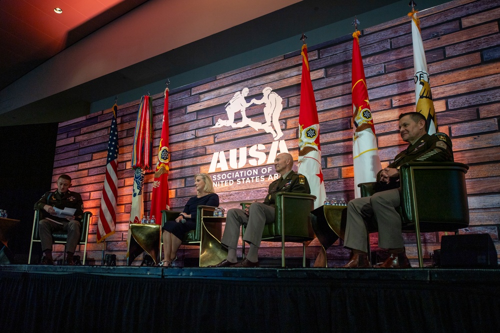 Secretary of the Army, Hon. Christine Wormuth, U.S. Army Gen. Randy George, Chief of Staff, and Sergeant Major of the Army Michael Weimer, speak during a fireside chat during the 2024 Association of the U.S. Army Annual Meeting and Exposition