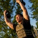 Participants of the 11th Annual Best Combat Camera Competition compete in an event testing their physical fitness.