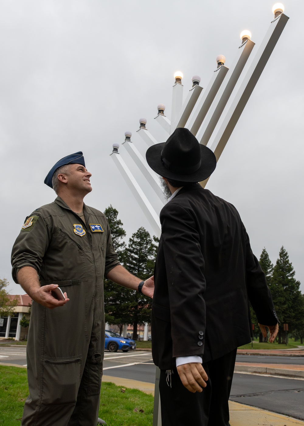 Team Travis celebrates Hanukkah with menorah lighting ceremony