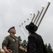 Team Travis celebrates Hanukkah with menorah lighting ceremony