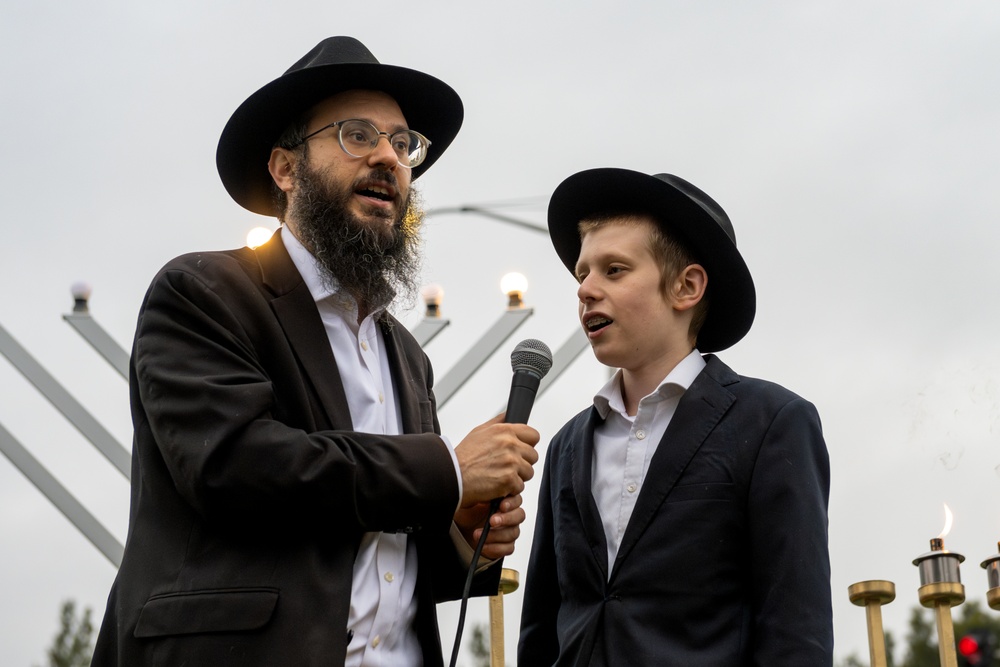 Team Travis celebrates Hanukkah with menorah lighting ceremony