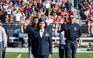 Recruits swear into the U.S. Air Force during the 2024 Lockheed Martin Armed Forces Bowl