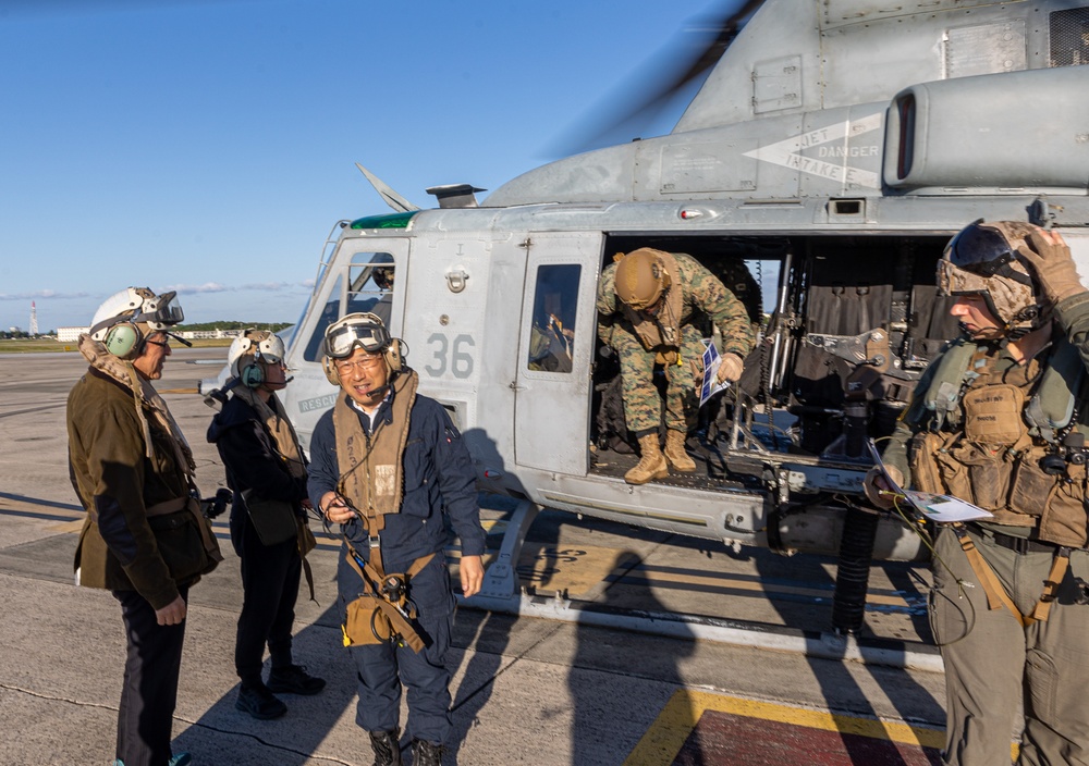 MCIPAC commanding general tours Jungle Warfare Training Center with Government of Japan officials