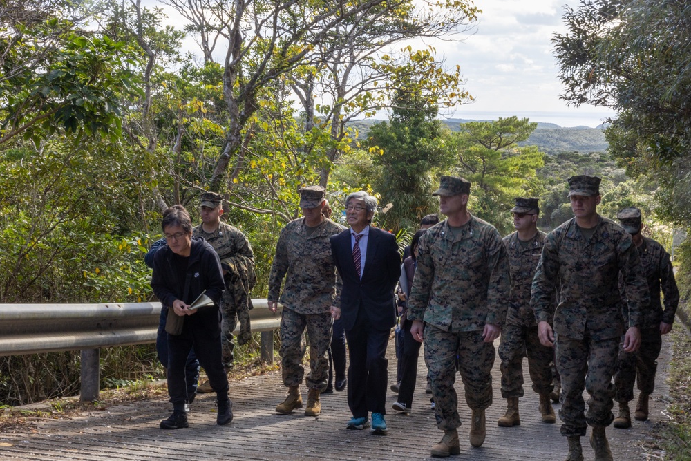 MCIPAC commanding general tours Jungle Warfare Training Center with Government of Japan officials