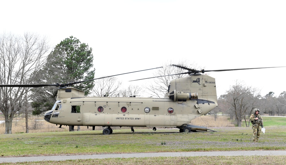 CH-47 waits on the arrival of General Charles Q. Brown Jr., Chairman of the Joint Chiefs of Staff, for his visit to Pine Bluff Arsenal, in Pine Bluff, Arkansas, on 14 Mar., 2024