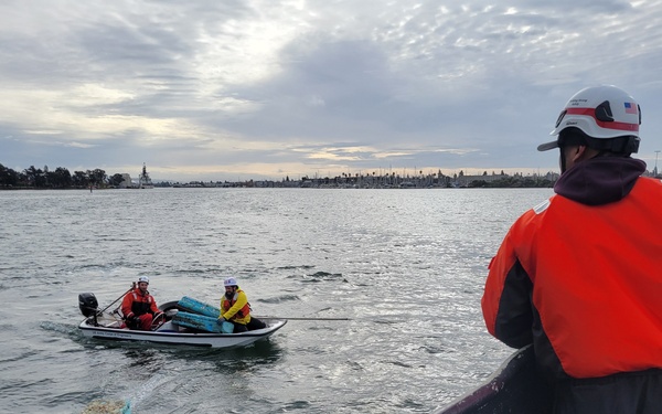 Raccoon crew removes hazards in Oakland