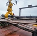 Raccoon crew removes hazards in Oakland