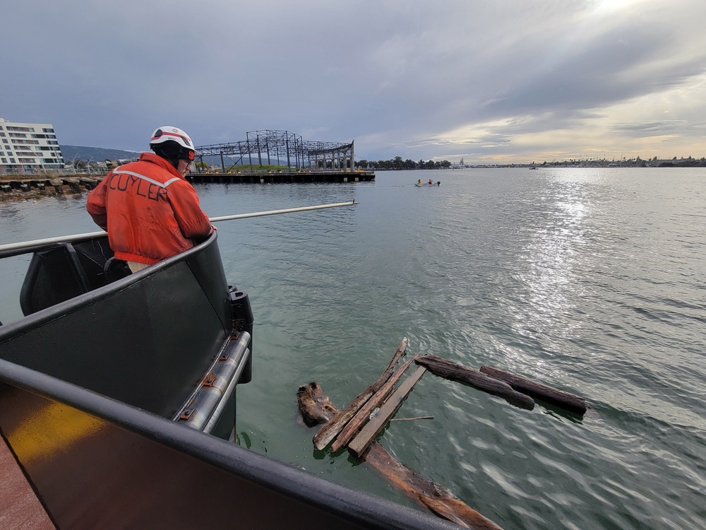 Raccoon crew removes debris in Oakland