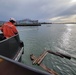 Raccoon crew removes debris in Oakland