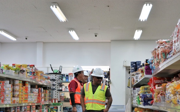 Safety personnel examine a store for H-2B visa workers at a contractor-owned facility