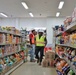 Safety personnel examine a store for H-2B visa workers at a contractor-owned facility