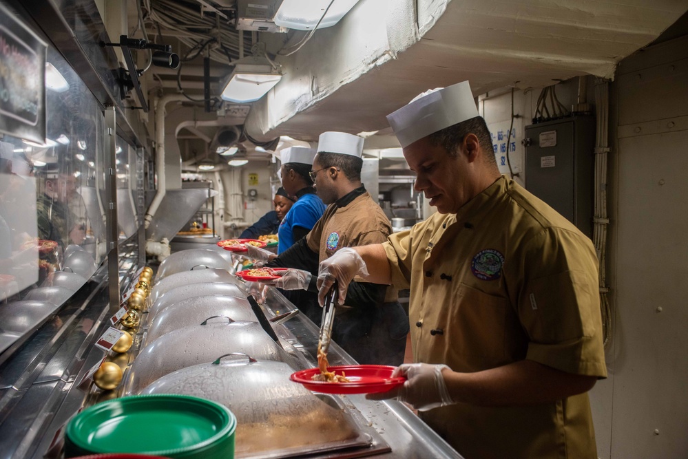 USS Ronald Reagan (CVN 76) hosts a Christmas meal