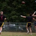 Airman throws the football