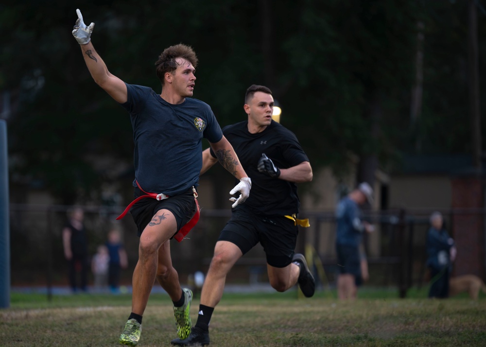 Airman signals to receive football