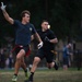 Airman signals to receive football