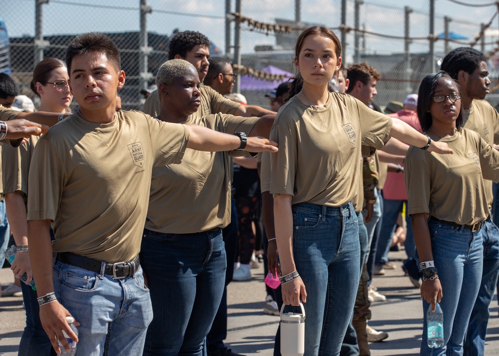 Recruits enlist into the Alabama National Guard at Talladega Superspeedway