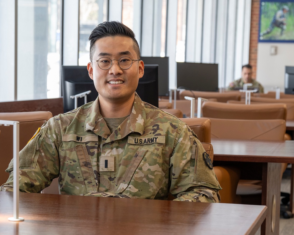 Photo By Billie Suttles | 226th Officer Basic Course student 1st Lt. Younghun Wi sits in The Judge Advocate General's Legal Center and School library.