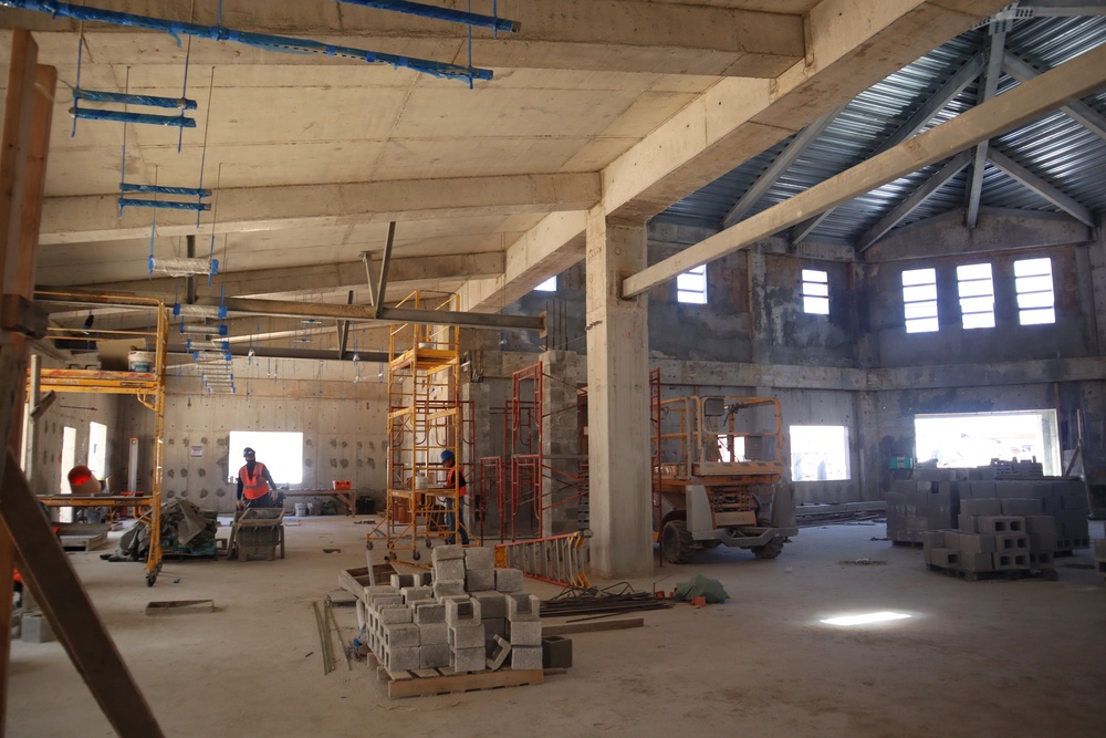 Contractors make progress on a community center under construction on Marine Corps Base Camp Blaz