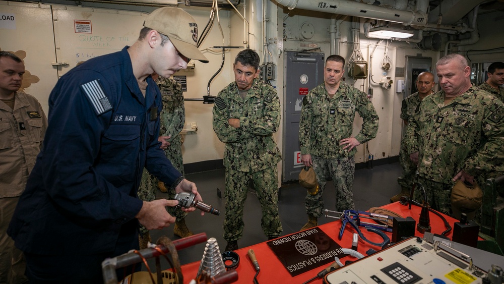 Emory S. Land Hosts Tour for Admiral in Singapore