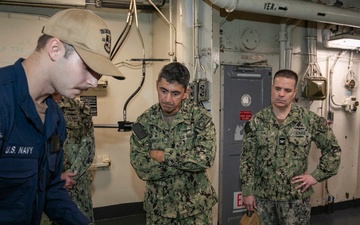 Emory S. Land Hosts Tour for Admiral in Singapore