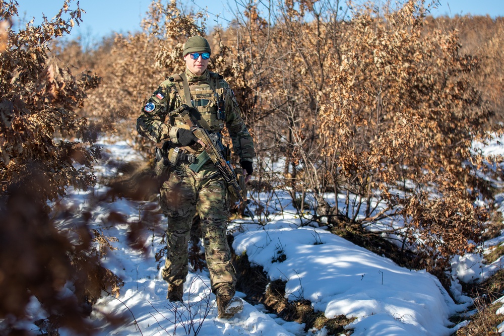 Polish Soldiers assigned to KFOR 34 conduct a routine security patrol in Kosovo