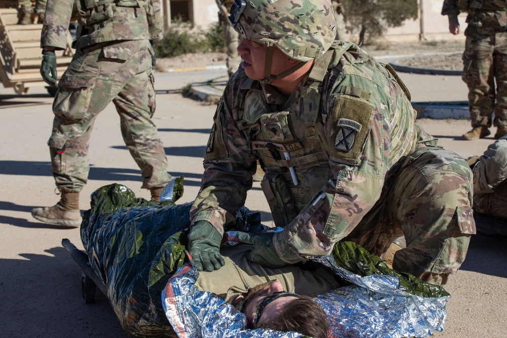 Coalition Forces Conduct Casualty Evacuation Training
