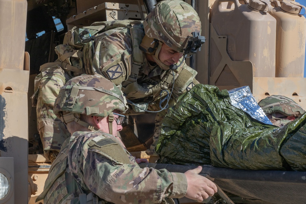 Coalition Forces Conduct Casualty Evacuation Training