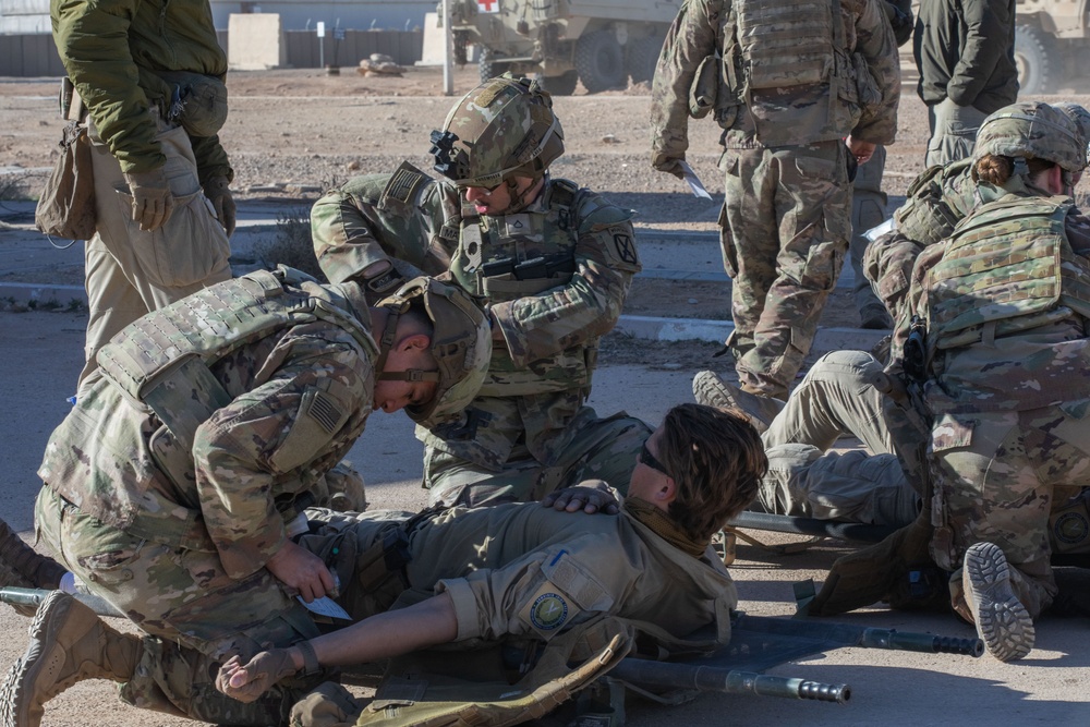 Coalition Forces Conduct Casualty Evacuation Training