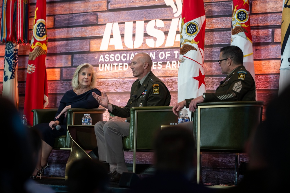 Secretary of the Army Hon. Christine Wormuth, U.S. Army Gen. Randy George, Chief of Staff, and Sergeant Major of the Army Michael Weimer, speak during a fireside chat  during the 2024 Association of the U.S. Army Annual Meeting and Exposition