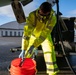 Fleet service Airmen ensure a squeaky-clean takeoff