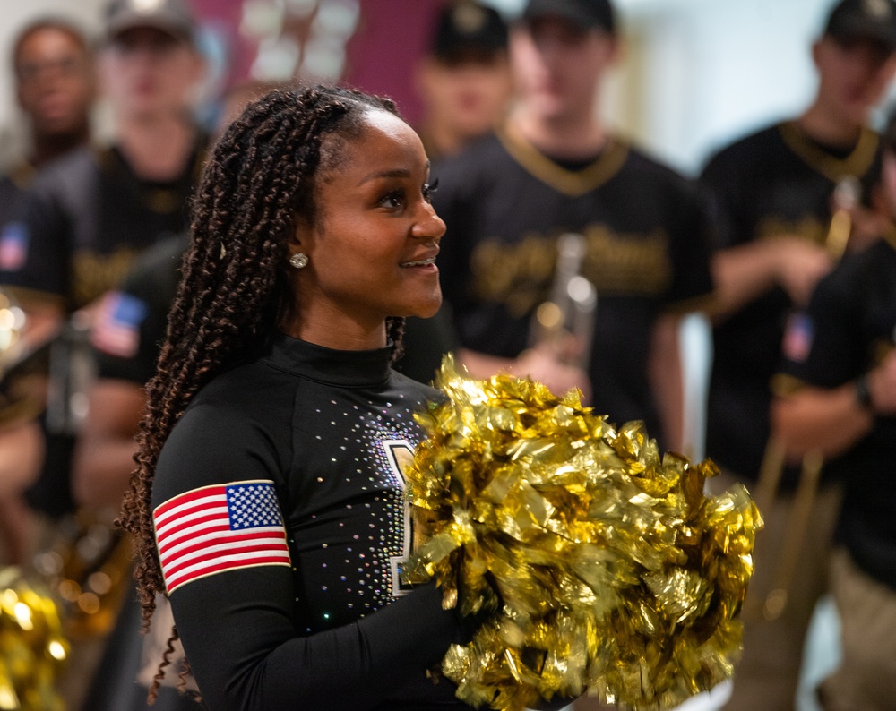 Members of the U.S. Military Academy at West Point Spirit Band stop by the office of Hon. Christine Wormuth, Secretary of the Army, during the Spirit Rally