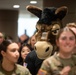 Members of the U.S. Military Academy at West Point Spirit Band stop by the office of Hon. Christine Wormuth, Secretary of the Army, during the Spirit Rally