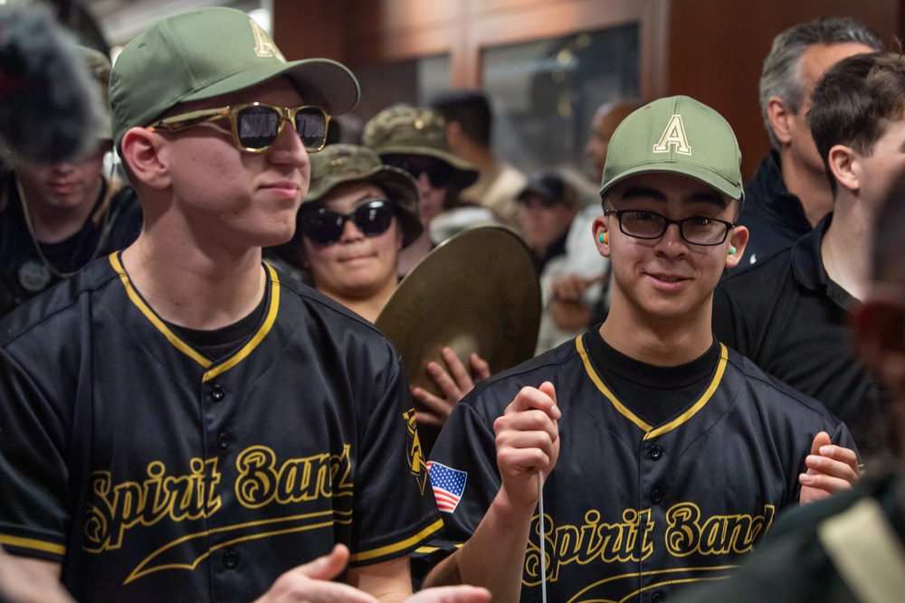 Members of the U.S. Military Academy at West Point Spirit Band stop by the office of Hon. Christine Wormuth, Secretary of the Army, during the Spirit Rally