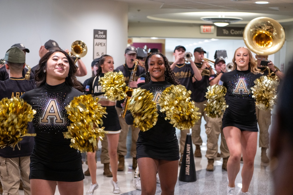 Members of the U.S. Military Academy at West Point Spirit Band stop by the office of Hon. Christine Wormuth, Secretary of the Army, during the Spirit Rally